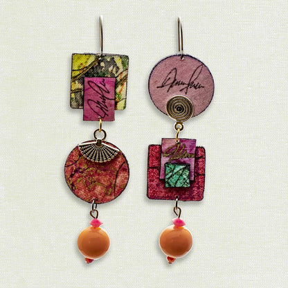 Asymmetric 3 tiered earrings, hand painted by artist Suzanne Bellows for SuzanneBellowsJewelry.com. This pair is part of the  Soft Collection and features a variety of pinks and peaches.